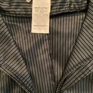 Italian made  Exquisite detailed V neck button down blouse excellent condition.